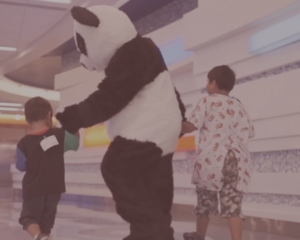 Panda with Children - Panda Cares brings hope to youth in need